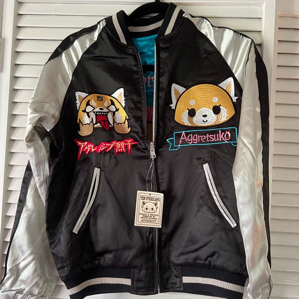 NWT Aggretsuko Aggressive Retsuko reversible Sanrio Jacket size small.